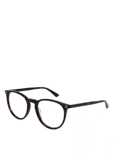 Shop Gucci Tortoiseshell Patterned Eyeglasses In Brown