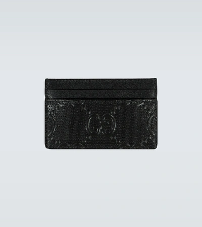 Shop Gucci Gg Embossed Leather Cardholder In Black