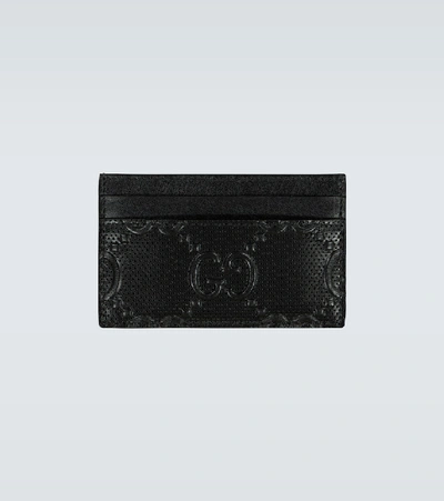 Shop Gucci Gg Embossed Leather Cardholder In Black