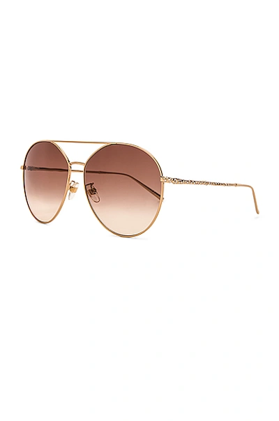 Shop Givenchy Round Sunglasses In Gold & Brown Gradient