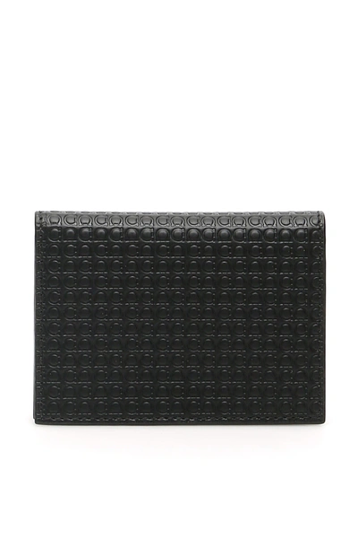 Shop Ferragamo Gancini Micro Bi-fold Cardholder In Nero (black)