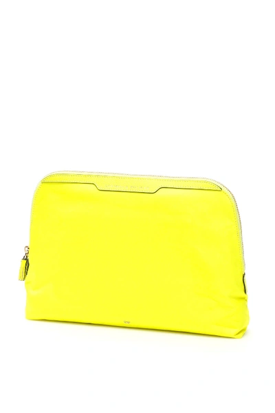 Shop Anya Hindmarch Lotions And Potions Pouch In Neon Yellow (yellow)