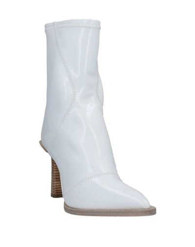 Shop Fendi Ankle Boots In White