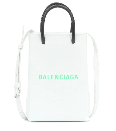 Shop Balenciaga Shopping Phone Pouch Leather Tote In White
