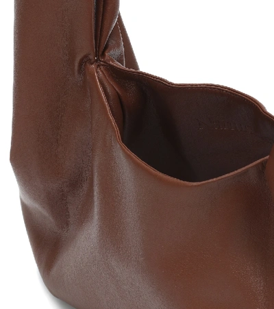 Shop Nanushka Jen Small Faux-leather Tote In Brown
