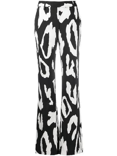 Shop Just Cavalli Giant Leopard Print Flared Trousers In Black