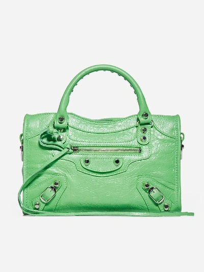 Shop Balenciaga Mini City Leather Bag In Light Green