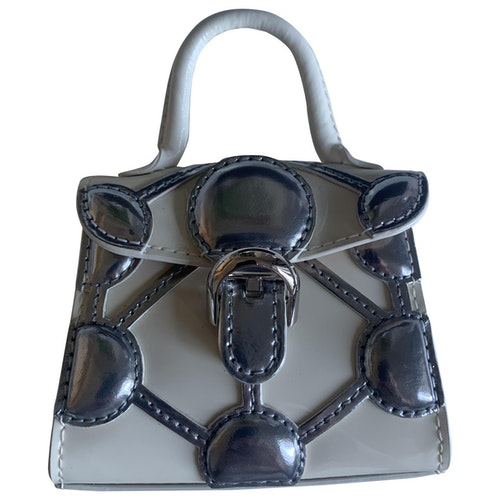 white patent leather clutch