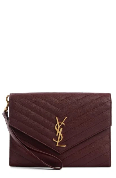 Shop Saint Laurent Monogramme Quilted Leather Clutch In Rouge Legion