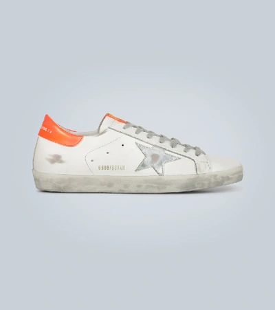 Shop Golden Goose Distressed Superstar Sneakers In White