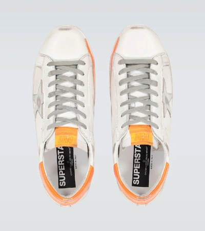 Shop Golden Goose Distressed Superstar Sneakers In White