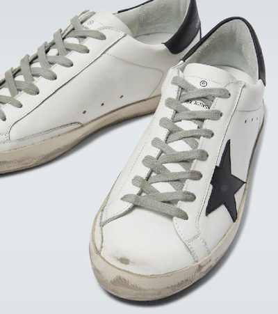 Shop Golden Goose Superstar Sneakers In White