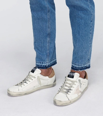 Shop Golden Goose Distressed Superstar Sneakers In White