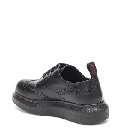 Shop Alexander Mcqueen Leather Brogues In Black