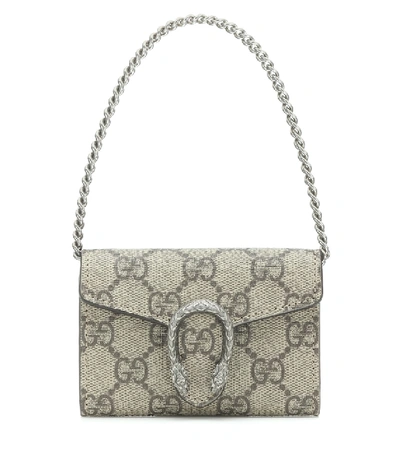 Shop Gucci Dionysus Gg Supreme Clutch In Beige