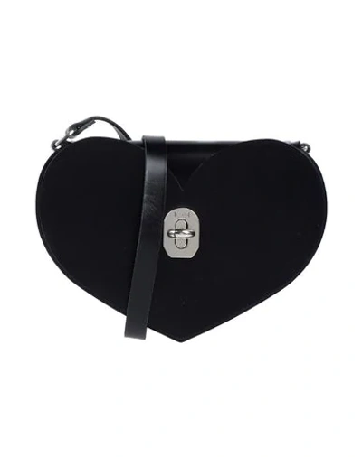 Shop Niels Peeraer Cross-body Bags In Black