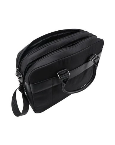 Shop Guess Handbags In Black