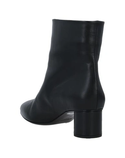 Shop Jil Sander Ankle Boot In Black