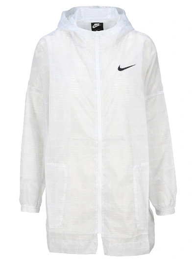 Shop Nike Su Transparent Rain Jacket In White