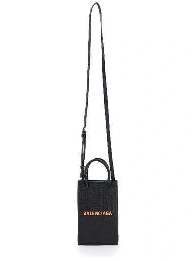 Shop Balenciaga Shopping Phone Holder Bag In Black/fluo Orange