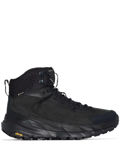 Shop Hoka One One Kaha Gtx Hiking Boots In Black