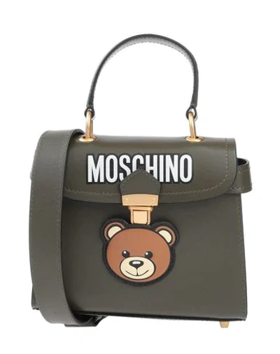 Shop Moschino Cross-body Bags In Military Green