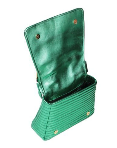 Shop Moschino Handbag In Green