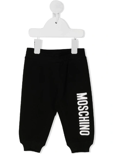 Shop Moschino Logo Print Tracksuit Bottoms In Black
