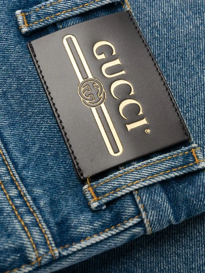 Shop Gucci Faded Straight-leg Jeans In Blue