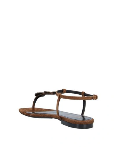 Shop Saint Laurent Flip Flops In Brown