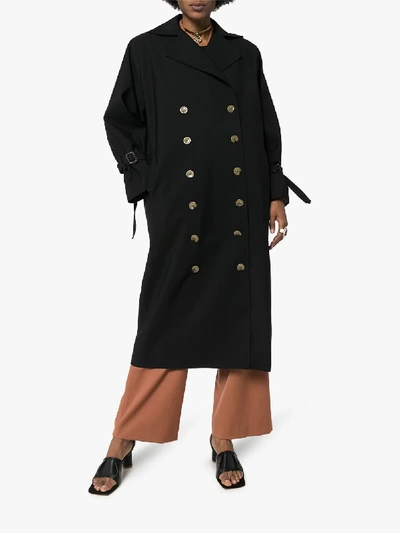 Shop Totême Double-breasted Trench Coat In Black
