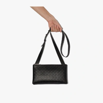 Shop Bottega Veneta Black Embossed Leather Messenger Bag