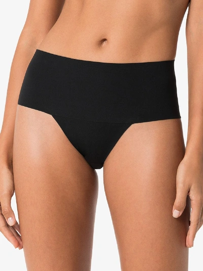 Spanx Undie-tectable Mid-rise Thong In Schwarz