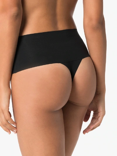 Spanx Undie-tectable Mid-rise Thong In Schwarz
