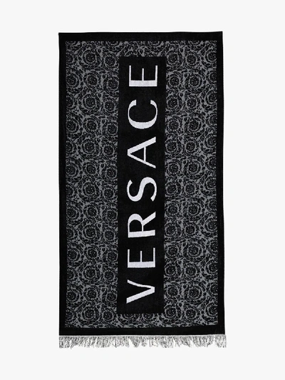 Shop Versace Black And White Logo Beach Towel