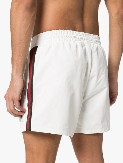 Shop Gucci Sylvie Web Swim Shorts In White