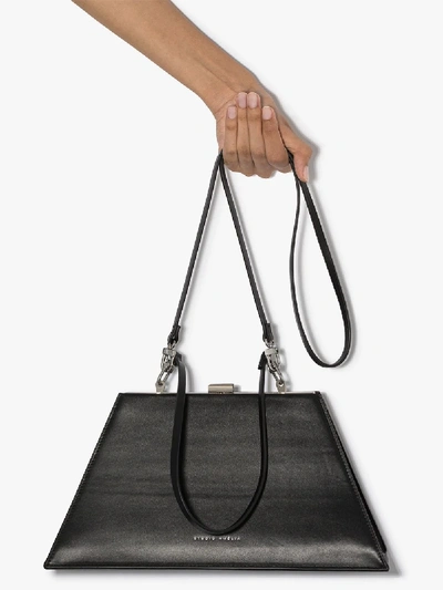Shop Studio Amelia Black 4.1 Midi Trapeze Leather Bag
