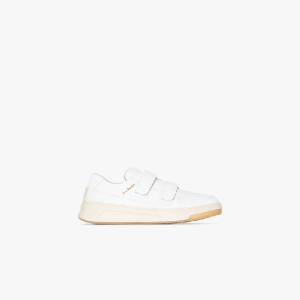 white sneakers with velcro straps