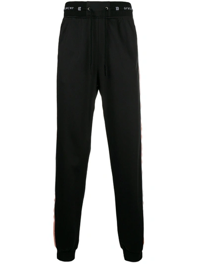 Shop Givenchy Elasticated Waist Trousers Black/orange
