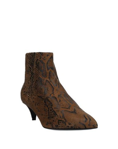 Shop Celine Ankle Boots In Brown