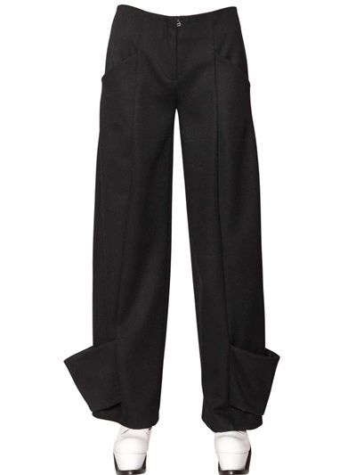 Jw Anderson Cuffed Wool Trousers In Black