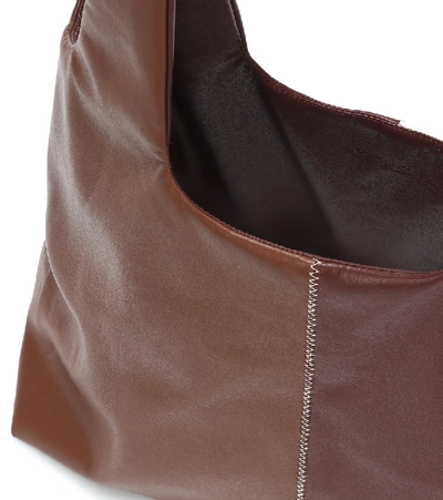 Shop Nanushka Jo Medium Faux-leather Shoulder Bag In Brown