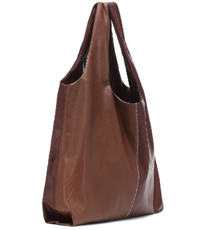Shop Nanushka Jo Medium Faux-leather Shoulder Bag In Brown