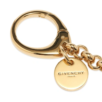 Shop Givenchy G-dice Arrow Charm Keyring In Gold