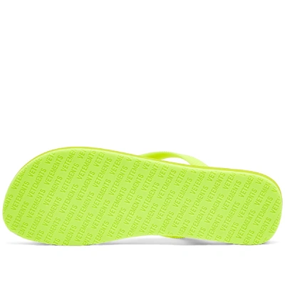 Shop Vetements Classic Logo Flip Flops In Yellow