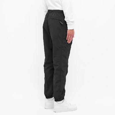 Shop Thisisneverthat Dsn Warmup Pant In Black