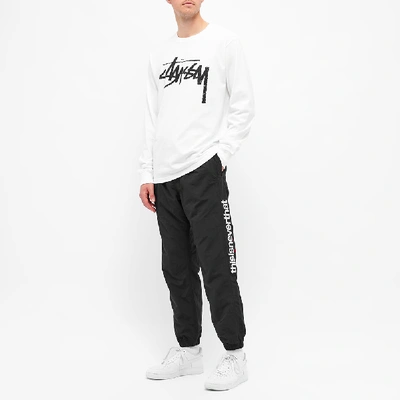 Shop Thisisneverthat Dsn Warmup Pant In Black