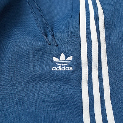 Shop Adidas Originals Adidas Superstar Track Pant In Blue