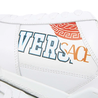 Shop Versace Split Tennis Sneaker In White