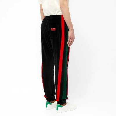 Shop Gucci Velour Grg Stripe Track Pant In Black